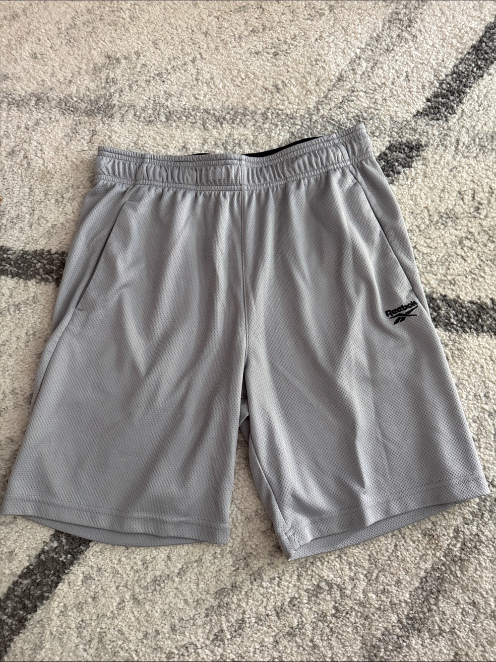 Reebok Men’s Light Gray Athletic Mesh Shorts with Logo